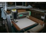 The CNC machine which cuts out the superstructure and other components ready for parting off.